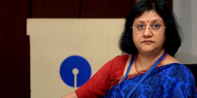 Chairperson of State Bank of India (SBI), Arundhati Bhattacharya attends the Finance Minister's meeting with Chief Executives of Public Sector bank and Financial Institutions in New Delhi on October 22, 2013. The meeting is to take stock of non-performing assets, credit growth and financial performance, include reviewing ways to cut down deteriorating asset quality, credit growth in the targeted sectors. AFP PHOTO/RAVEENDRAN. (Photo credit should read RAVEENDRAN/AFP/Getty Images)