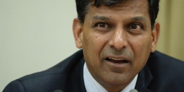 Reserve Bank of India (RBI) governor Raghuram Rajan speaks during a news conference at the RBI headquarters in Mumbai on December 2, 2014. India's central bank kept interest rates unchanged on December 2 despite growing calls to ease monetary policy, saying a reduction would be 'premature'. AFP PHOTO/ PUNIT PARANJPE (Photo credit should read PUNIT PARANJPE/AFP/Getty Images)