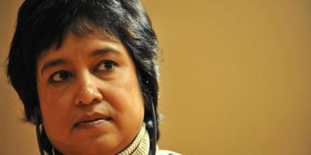 Bangladeshi writer Taslima Nasreen listens as she attends the 4th edition of the Women's Forum for the Economy and Society 'Building the future with women's vision' on October 17, 2008 in Deauville. AFP PHOTO MYCHELE DANIAU (Photo credit should read MYCHELE DANIAU/AFP/Getty Images)