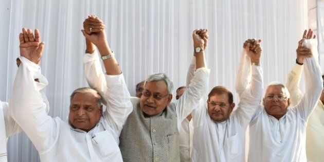 (L-R) Samajwadi Party chief Mulayam Singh Yadav, Nitish Kumar, chief minister of Bihar, Sharad Yadav of the Janata Dal (United) party, Lalu Prasad Yadav of Rashtriya Janata Dal party pose for photographers ahead of a press conference in New Delhi on April 15, 2015. Six Indian left-leaning and regional political parties vowed to work together to take on Prime Minister Narendra Modi's right-wing Bharatiya Janata Party ahead of key Bihar state elections scheduled later in the year. AFP PHOTO / SAJJAD HUSSAIN (Photo credit should read SAJJAD HUSSAIN/AFP/Getty Images)