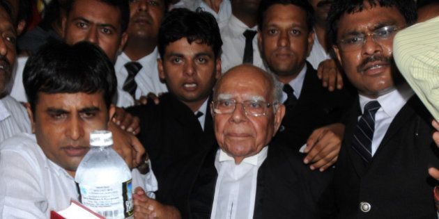 Indian lawyer Ram Jethmalani (C) leaves the special Central Bureau of Investigation (CBI) court in Ahmedabad on August 2, 2010. Jethmalani and his son Mahesh Jethmalani are representing former Gujarat state Home Minister Amit Shah in the case of an alleged faked police encounter that lead to the death of Sohrabuddin Sheikh. AFP PHOTO/ Sam PANTHAKY (Photo credit should read SAM PANTHAKY/AFP/Getty Images)