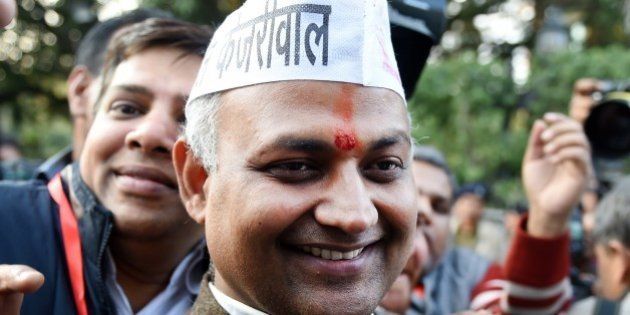 Senior Leader of India's Aam Aadmi Party (AAP) Somnath Bharti (C) arrives for a meeting in New Delhi on February 10, 2015. India's Narendra Modi suffered his first major election setback since becoming prime minister last May, as anti-corruption campaigner Arvind Kejriwal won a landslide victory in Delhi state polls. AFP PHOTO / SAJJAD HUSSAIN (Photo credit should read SAJJAD HUSSAIN/AFP/Getty Images)