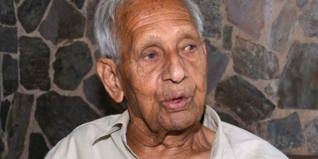 To go with India-garden-environment-tourism,FEATURE by Abhaya SRIVASTAVA This photo taken on October 31, 2014 shows self-taught Indian artist Nek Chand Saini talking to journalists on the eve of his 90th birthday at the rock garden that he built in Chandigarh. Deep inside his massive garden of handmade waterfalls and sculptures, Nek Chand recalls toiling away secretly in the dead of night for a staggering 18 years to create his wonderland in north India. Riding his bicycle after dark to a state-owned forest, Chand spent night after night clearing patches of ground and transforming the landscape into a majestic garden that would eventually cover 20 acres (8 hectares). AFP PHOTO/NARINDER NANU---- EDITORS NOTE ---- RESTRICTED TO EDITORIAL USE, MANDATORY CREDIT OF THE ARTIST, TO ILLUSTRATE THE EVENT AS SPECIFIED IN THE CAPTION (Photo credit should read NARINDER NANU/AFP/Getty Images)