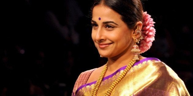 Indian Bollywood actress Vidya Balan showcases a creation by designer Gaurang on the second day of the Lakme Fashion Week (LFW) summer/resort 2015 in Mumbai on March 19, 2015. AFP PHOTO (Photo credit should read STR/AFP/Getty Images)