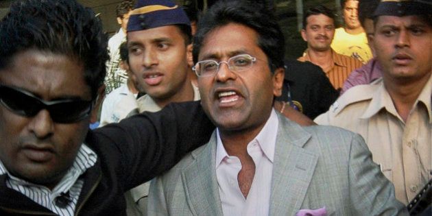 In this Tuesday, April 20, 2010 file photo, then Indian Premier League (IPL) Chairman Lalit Modi arrives at the airport in Mumbai, India. The Indian Premier League's governing council Monday appointed cricket board vice president Chirayu Amin as IPL's interim chairman in place of suspended chief Lalit Modi, who is facing an inquiry over allegations of corruption. (AP Photo) ** INDIA OUT **