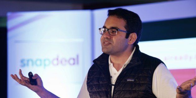 Co-Founder and CEO of Snapdeal Kunal Bahl gestures while addressing the media in Bangalore on April 8, 2015. India's largest online marketplace Snapdeal on April 8 announced that it has acquired 'FreeCharge' India's fastest growing mobile transactions platform, said to be one of the biggest acquisitions in the history of the Internet industry in India. AFP PHOTO/Manjunath KIRAN (Photo credit should read MANJUNATH KIRAN/AFP/Getty Images)