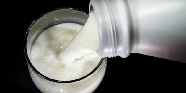 Milk is poured from a plastic bottle in a glass on November 16, 2014 in Lille. AFP PHOTO / PHILIPPE HUGUEN (Photo credit should read PHILIPPE HUGUEN/AFP/Getty Images)