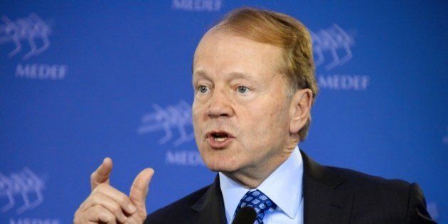 US Cisco Systems CEO John Chambers gestures during a press conference about digital technologies in France, at the headquarters of French employers organisation Medef in Paris, on February 17, 2015. AFP PHOTO / BERTRAND GUAY (Photo credit should read BERTRAND GUAY/AFP/Getty Images)