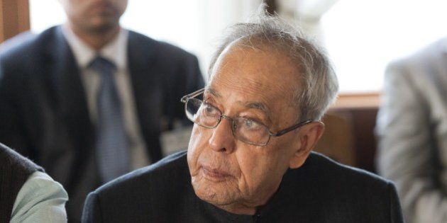 President of India Shri Pranab Mukherjee listens during a boat trip to Hammarby Sjoestad and roundtable discussion about 'Smart Cities' on June 1, 2015 in Stockholm on the second day of Shri Pranab Mukherjee's official three day visit in Sweden. AFP PHOTO / JONATHAN NACKSTRAND (Photo credit should read JONATHAN NACKSTRAND/AFP/Getty Images)