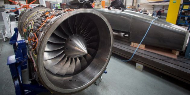 BRISTOL, ENGLAND - MARCH 05: A jet engine is seen as engineers work on the carbon-fibre body of the Bloodhound SSC vehicle currently taking shape at its design centre in Avonmouth on March 5, 2015 in Bristol, England. It is hoped that when finished, the Bloodhound SSC car, which is powered by a Eurofighter jet engine and a rocket, will break the current land speed record of 763mph or 1228km/h. Although the Bloodhound SSC is a private venture it has substantial in-kind support from the UK government and is being used as a education resource with the hope that it will encourage more pupils to follow science and technology-related courses. (Photo by Matt Cardy/Getty Images)
