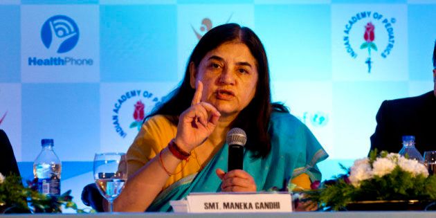 India's Women and Child Development Minister Maneka Gandhi, center, Nand Wadhwa, founder of HealthPhone, left, and S.S Kamath, President of Indian Academy of Pediatrics, attend the launch of a mobile education program for mothers in New Delhi, India, Tuesday, June 2, 2015. The program is aimed at providing health and nutrition education to reduce child malnutrition. (AP Photo/Saurabh Das)