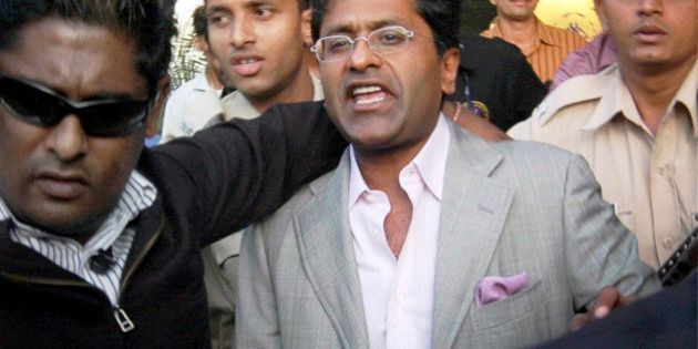 Indian Premier League (IPL) Chairman Lalit Modi arrives at the airport in Mumbai, India, Tuesday, April 20, 2010. Top cricket officials hope to resolve next week the crisis facing the IPL, including the future of Modi, beleaguered by allegations of corruption in an auction to add a new team to the lucrative tournament. (AP Photo) **INDIA OUT **