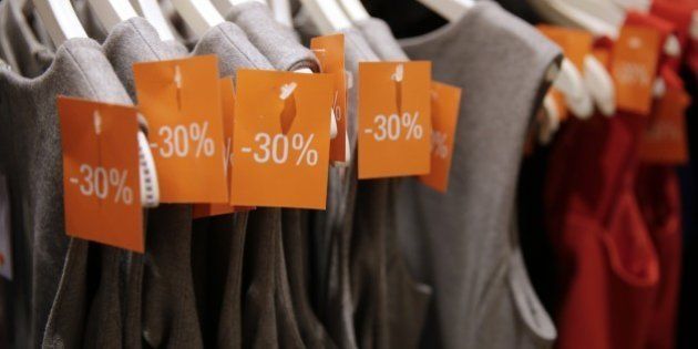 Clothes are on display with reduced prices in a French department store, at the start of the summer sales, on June 24, 2015 in Paris. Sales in France run until August 4. AFP PHOTO / KENZO TRIBOUILLARD (Photo credit should read KENZO TRIBOUILLARD/AFP/Getty Images)