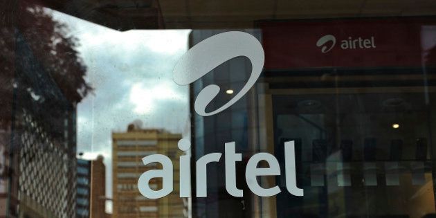 TO GO WITH AFP STORY BY OTTO BAKANOThe logo of giant mobile- telecommunications service provider 'Airtel' is branded on a shop window on May 20, 2011 in the Kenyan capital, Nairobi. India will seek to expand its economic footprint in Africa, where its rival China has made major inroads, at the second India-Africa summit next week in Addis Ababa. India's Bharti Airtel -- the world's fifth largest mobile phone company -- acquired the 16-African country unit of Kuwaiti telecom firm, Zain at a cost of $10.7 billion in 2010 when India's imports from Africa were worth $20.7 billion and its exports stood at $10.3 the same year even though China's trade with Africa remains far heftier. AFP PHOTO/Tony KARUMBA (Photo credit should read TONY KARUMBA/AFP/Getty Images)