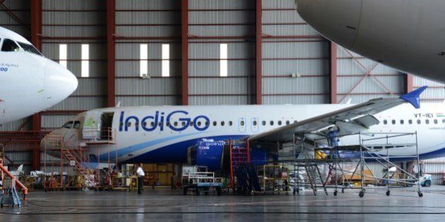 In this photograph taken on November 10, 2014 an aircraft of the Indian budget carrier IndiGo undergoes maintenance at the Sri Lankan airlines technical service centre at the main international airport in Colombo. Sri Lanka has decided to build its own aircraft repair, maintenance and overall (MRO) facility targeting regional airlines after scrapping joint venture plans with a German company, officials said November 11, 2014. AFP PHOTO / LAKRUWAN WANNIARACHCHI (Photo credit should read LAKRUWAN WANNIARACHCHI/AFP/Getty Images)