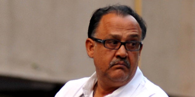 Indian Bollywood actor Alok Nath attends a memorial prayer for late Bollywood actor Farooq Sheikh in Mumbai on December 30, 2013. Sheikh died of a heart attack late December 27 in Dubai where he was on holiday. He was 65. AFP PHOTO/STR (Photo credit should read STRDEL/AFP/Getty Images)