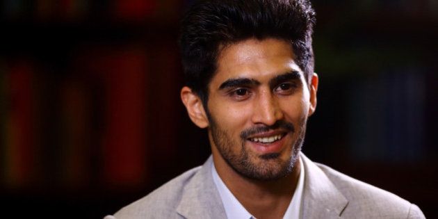LONDON, ENGLAND - JUNE 29: Vijender Singh gives a TV interview during a Press Conference at the Cinnamon Club on June 29, 2015 in London, England. (Photo by Jordan Mansfield/Getty Images)