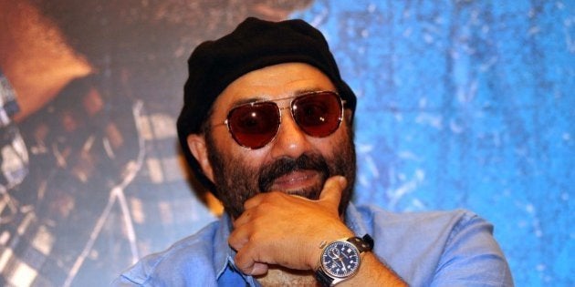 Indian Bollywood actor Sunny Deol looks on during a promotional event for the forthcoming Bollywood film 'Dishkiyaaoon' produced by Shilpa Shetty and directed by Sanamjit Singh Talwar in Mumbai on March 25, 2014. AFP PHOTO/STR (Photo credit should read STRDEL/AFP/Getty Images)