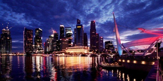 Singapore skyline from Esplanade. Taken just after the sunsetCamera: Nikon FELens: Nikkor 20mm f/2.8 AISFilm: Fuji Superia 800No tripod