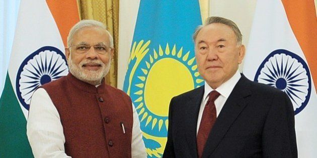 Kazakh President Nursultan Nazarbayev (R) shakes hands with Indian Prime Minister Narendra Modi during their meeting in Astana on July 8, 2015. AFP PHOTO / ILYAS OMAROV (Photo credit should read ILYAS OMAROV/AFP/Getty Images)