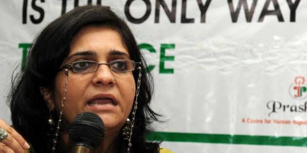 Secretary of The Citizens for Justice and Peace (CJP) Teesta Setalvad addresses media representatives during a press conference in Ahmedabad on August 14, 2010, held under the auspices of The Citizens for Justice and Peace (CJP) organisation. Sandhi spoke of the Gujarat riots in 2002 in the western Indian city which were sparked off by an incident on a train in the town of Godhra. AFP PHOTO/Sam PANTHAKY (Photo credit should read SAM PANTHAKY/AFP/Getty Images)