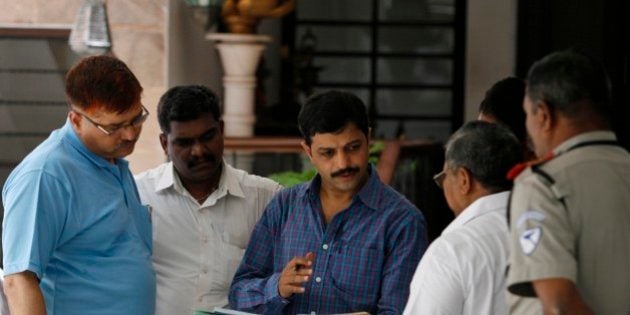 Indiaâs Mumbai Crime Branch police officers raid the residence of Gurunath Meiyappan, the chief executive of the Chennai Super Kings cricket team in Chennai, India, Sunday, May 26, 2013. India's cricket chief Narainswamy Srinivasan said on Sunday a committee will look into allegations against his son-in-law and Chennai Super Kings official Gurunath Meiyappan after his arrest during investigations for spot-fixing by Indian police. (AP Photo/Arun Sankar K)