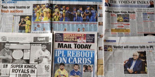 This photo illustration taken in New Delhi on July 15, 2015, shows Indian media coverage of the suspension of the Chennai Super Kings and Rajasthan Royals cricket teams from the Indian Premier League's next two editions after top officials were caught betting on matches involving their own teams. India's cricketing fraternity July 15 welcomed the shock decision to ban two teams from the IPL as a long overdue opportunity for the game to clean up its scandal-sullied image. AFP PHOTO (Photo credit should read STR/AFP/Getty Images)