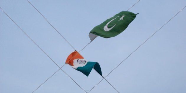 At the end of the guard changing ceremony at the Pakistan-India border the respective flags are lowered.