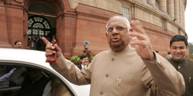 ** FILE ** In this Feb. 28, 2007 file photo, Indian Speaker of Lower House, Somnath Chatterjee gestures as he leaves the Parliament House in New Delhi, India. A day after Prime Minister Manmohan Singh won a confidence vote that paves the way for a landmark nuclear deal with the United States,the Communist Party of India (Marxist) kicked out Chatterjee, who defied the party's leadership and chaired the debate instead of giving up the speakership so he could vote as a regular member of parliament. (AP Photo/Gurinder Osan, File)