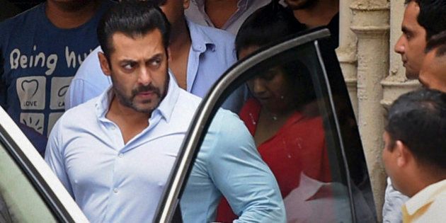 INDIA OUT - Bollywood actor Salman Khan leaves home for court in Mumbai, India, Friday, May 8, 2015. A court on Friday granted bail to Khan, one of India's biggest movie stars, until it hears his appeal challenging his conviction in a drunk-driving hit-and-run case more than a decade ago. (Shashank Parade/Press Trust of India via AP)