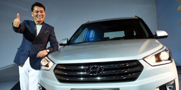 Managing Director and CEO, Hyundai Motors India limited, B S Seo poses during the launch of the Hyundai Creta in New Delhi on July 21, 2015. The five-seater SUV is being launched globally in India. AFP PHOTO / MONEY SHARMA (Photo credit should read MONEY SHARMA/AFP/Getty Images)
