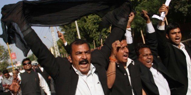 Indian lawyers shout slogans during a protest against the visit of Pakistani Prime Minister Raja Pervaiz Ashraf in Ajmer, India, Saturday, March 9, 2013. Ashraf is in India on a daylong private trip to visit the shrine of Khwaja Moinuddin Chishti in Ajmer. Sufism is a more mystical form of Islam that is practiced in many parts of South Asia. (AP Photo/Deepak Sharma)
