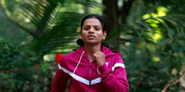 In this Wednesday, Oct. 29, 2014 photo, Indian athlete Dutee Chand poses for the Associated Press in Mumbai, India. The 18-year-old has now decided to fight the ban for 'hyperandrogenism' or the presence of high levels of testosterone in the body that makes the sprinter ineligible to compete according to International Association of Athletics Federation rules. Chand won two gold medals at the Asian junior track and field championship. (AP Photo/Rafiq Maqbool)