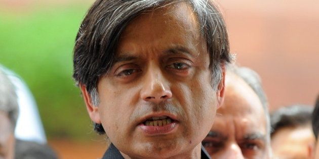 Indian Junior Foreign Minister Shashi Tharoor addresses the media at parliament house in New Delhi on April 16, 2010. Junior Indian Foreign Minister and former high-flying UN official Shashi Tharoor, 54, has been in the eye of a storm since the weekend when news broke that a friend, said by Indian media to be his girlfriend, had been given a free stake in a new IPL franchise. Tharoor has denied the allegations. AFP PHOTO/Prakash SINGH (Photo credit should read PRAKASH SINGH/AFP/Getty Images)