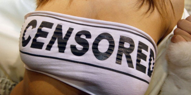 LAS VEGAS, NV - JANUARY 10: A woman's shirt that says 'censored' is seen at the AVN Adult Entertainment Expo January 10, 2004 in Las Vegas. Thousands attended the three-day conference featuring adult film stars and adult sex toys. (Photo by Justin Sullivan/Getty Images)