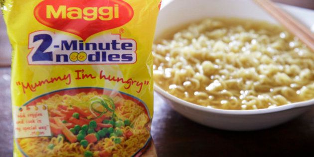 A packet and a cooked bowl of Maggi 2-Minute Noodles, manufactured by Nestle India Ltd., are arranged for a photograph in New Delhi, India, on Monday, June 15, 2015. Nestle SA said the U.S. Food and Drug Administration is testing samples of imported Maggi noodles after the worlds largest food company halted sales in India when regulators said they contained unhealthy levels of lead. Photographer: Kuni Takahashi/Bloomberg via Getty Images