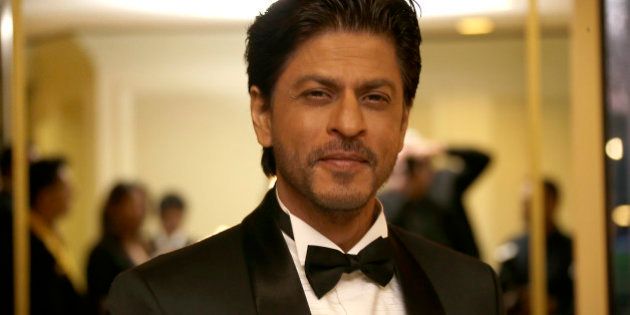 Shah Rukh Khan poses for photographers upon arrival at The Asian Awards in central London, Friday, 17 April, 2015. (Photo by Joel Ryan/Invision/AP)