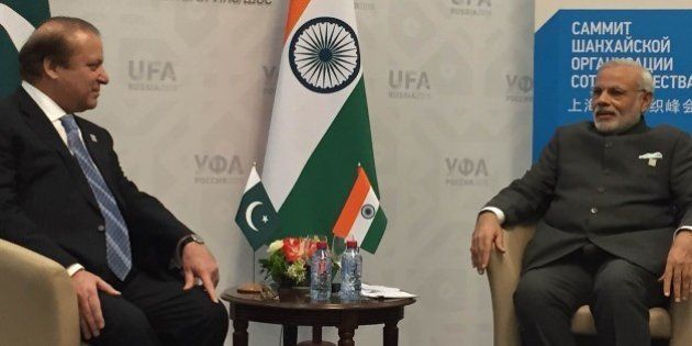 UFA, RUSSIA - JULY 10: Pakistani Prime Minister Muhammad Nawaz Sharif (L) and India's Prime Minister Narendra Modi (R) meet during Shanghai Cooperation Organization (SCO) summit in Ufa on July 10, 2015. (Photo by Pakistani Foreign Ministry/Anadolu Agency/Getty Images)