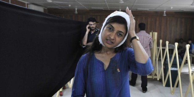 NEW DELHI, INDIA - AUGUST 9: AAP MLA from Chandni Chowk Alka Lamba during a press conference after she was injured during her anti-drug addiction campaign in north Delhi's Kashmere Gate area on Sunday morning, on August 9, 2015 in New Delhi, India. Lamba started an anti-drug drive at 5 a.m. from Yamuna Bazar to mark the Quit India Movement Day. She alleged that the incident was a conspiracy against her anti-drug drive and urged the police to conduct a fair probe into the matter. She received head injuries and was rushed to Aruna Asaf Ali Hospital, where she was discharged after treatment. (Photo by Sushil Kumar/Hindustan Times via Getty Images)