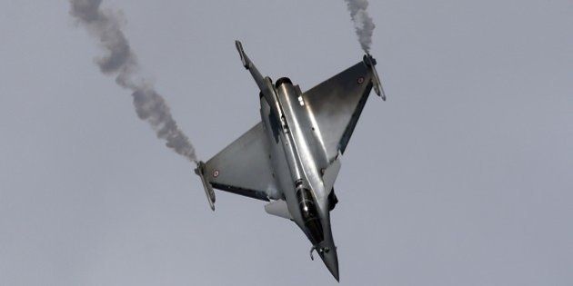 The Dassault Rafale fighter jet performs its flying display on the first public day at the International Paris Airshow at Le Bourget on June 19, 2015. AFP PHOTO / MIGUEL MEDINA (Photo credit should read MIGUEL MEDINA/AFP/Getty Images)