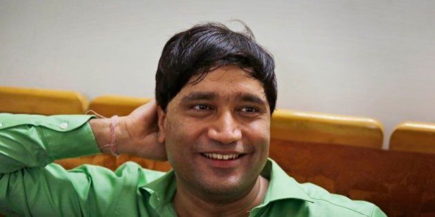 Indian anti-corruption campaigner Sanjiv Chaturvedi, talks to reporters at his residence after his name was announced among this year's recipients of the Philippines' Ramon Magsaysay Award, in New Delhi, India, Wednesday, July 29, 2015. The award foundation announced Wednesday that Chaturvedi, 40, who began investigating and blowing the whistle on government anomalies as a forest service officer in 2005, had won the award for emergent leadership for his