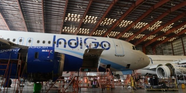 In this photograph taken on November 10, 2014 an aircraft of the Indian budget carrier IndiGo undergoes maintenance at the Sri Lankan airlines technical service centre at the main international airport in Colombo. Sri Lanka has decided to build its own aircraft repair, maintenance and overall (MRO) facility targeting regional airlines after scrapping joint venture plans with a German company, officials said November 11, 2014. AFP PHOTO / LAKRUWAN WANNIARACHCHI (Photo credit should read LAKRUWAN WANNIARACHCHI/AFP/Getty Images)