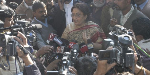 INDIA - DECEMBER 19: Neelam Katara, mother of Nitish Katara, speaks to media persons just after the court's judgment in which Manu Sharma was found guilty in the Jessica Lal murder case at the Delhi High Court premises, New Delhi. (Photo by Imtiyaz Khan/The India Today Group/Getty Images)