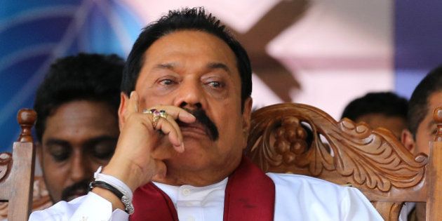 KANDY, SRI LANKA- AUGUST 14 : Former Sri Lankan president and parliamentary candidate Mahinda Rajapaksa attends his party's final day of election campaign rally on August 14, 2015 in Kandy, Sri Lanka. Sri Lanka's Election Commission has scheduled the polls on August 17, 2015, after Sri Lankan President Maithripala Sirisena dissolved the parliament on June 26, 2015. (Photo by Buddhika Weerasinghe/Getty Images)