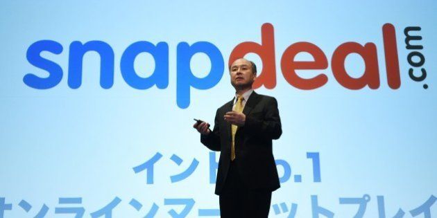 Chairman of Japanese mobile carrier SoftBank, Masayoshi Son, speaks about the company's investment over Indian leading online marketplace Snapdeal.com during a press conference in Tokyo on November 4, 2014. SoftBank said net profit in the first six months of its fiscal year jumped by more than a third, thanks to a five-billion-USD gain from its stake in Chinese e-commerce giant Alibaba. AFP PHOTO / TOSHIFUMI KITAMURA (Photo credit should read TOSHIFUMI KITAMURA/AFP/Getty Images)