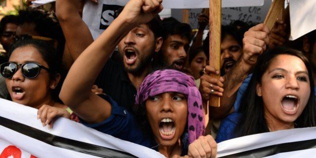 Indian students from the Film and Television Institute of India (FTII), along with other student activists, chant slogans during a protest against the appointment of Gajendra Chauhan as the chairman of the FTII, in New Delhi on August 3, 2015. Protesters are demanding the removal of Chauhan, who they say is not qualified for the post but was given the position due to political reasons, and have been boycotting their classes at the institute over the issue since June 12. AFP PHOTO / SAJJAD HUSSAIN (Photo credit should read SAJJAD HUSSAIN/AFP/Getty Images)