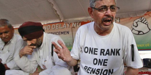 NEW DELHI, INDIA - AUGUST 17: Col (Retd.) Pushpender Singh (R) and Hav. (Retd.) Major Singh (2R) on indefinite hunger strike with others at Jantar Mantar on August 17, 2015 in New Delhi, India. Cranking up pressure on the government to implement 'One Rank, One Pension' (OROP) scheme, 10 former Service Chiefs have written to the Prime Minister pressing for its expeditious resolution even as two ex-Army men began an indefinite hunger fast at Jantar Mantar. (Photo by Sanjeev Verma/Hindustan Times via Getty Images)