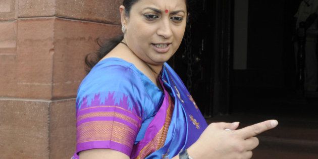 NEW DELHI, INDIA - JULY 27: HRD Minister Smriti Irani arrives to attend the Monsoon Session at the Parliament House on July 27, 2015 in New Delhi, India. Lok Sabha proceedings were repeatedly disrupted as the opposition once again raised the Lalit Modi and Vyapam issues, even as the speaker tried to conduct the business of the house. (Photo by Sonu Mehta/Hindustan Times via Getty Images)