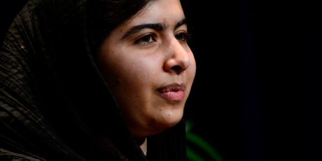 DENVER, CO - June 24: Malala Yousafzai, 17, speaks about her life before and after living under Taliban regime in Pakistan on Wednesday, June 24, 2015 at the Bellco Theater in Denver, Colorado. Yousafzai, who won the 2014 Nobel Peace Prize, is an advocate for education, especially for girls and women. She was shot in 2012 by the Taliban on her way home from school with friends for speaking out against girls getting the opportunity to get an education. (Photo By Brent Lewis/The Denver Post via Getty Images)
