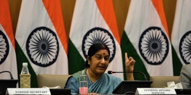 Indian Foreign Affairs Minister Sushma Swaraj gestures during a press conference in New Delhi on August 22, 2015. India issued an ultimatum to Pakistan on August 22, giving Islamabad until midnight to agree to restrict high-level bilateral talks to militancy alone, leaving a planned meeting between the two countries' national security advisers in doubt. AFP PHOTO / Chandan KHANNA (Photo credit should read Chandan Khanna/AFP/Getty Images)